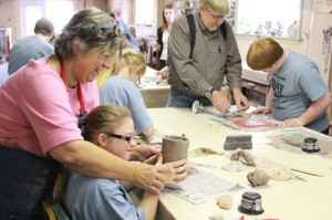 Students making pottery